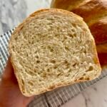 Inside of a loaf of no knead sourdough sandwich bread