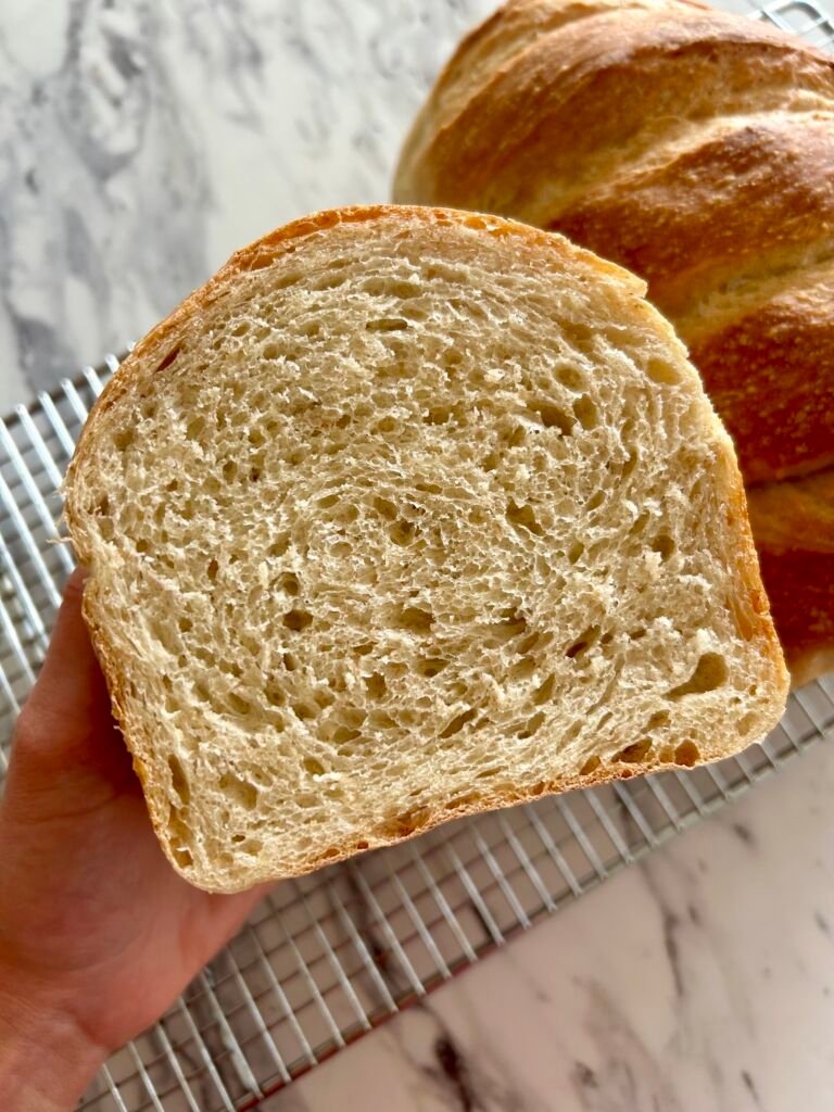 Inside of a loaf of no knead sourdough sandwich bread